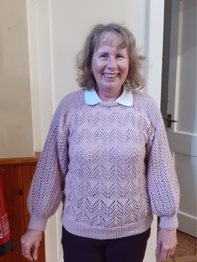 Jan's wonderful knitted jumper is being modelled by its creator.